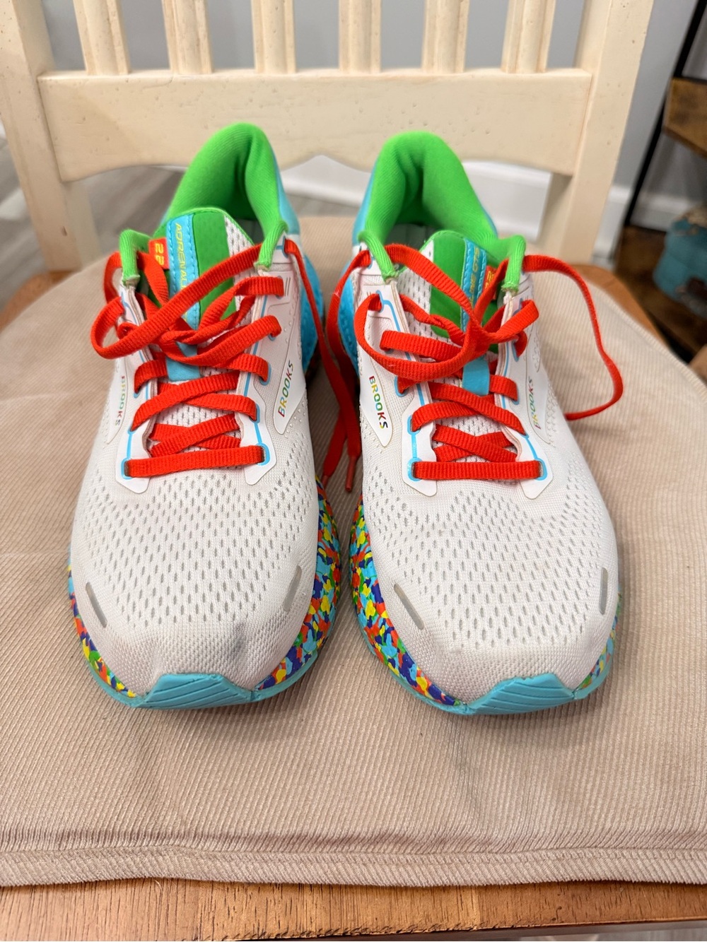 Brooks White Athletic Shoes with Red Laces and Green Lining